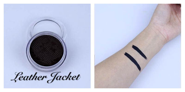 Leather Jacket black face and body paint in a clear jar with two matte black swatches on a forearm.