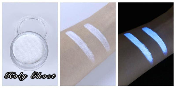 Holy Ghost UV neon white face and body paint in a jar, shown as a skin swatch and glowing blue under blacklight.