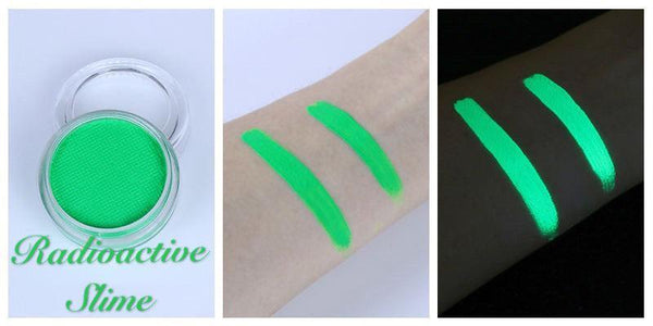 Radioactive Slime neon green UV face and body paint in a jar, shown as a skin swatch and glowing under blacklight.
