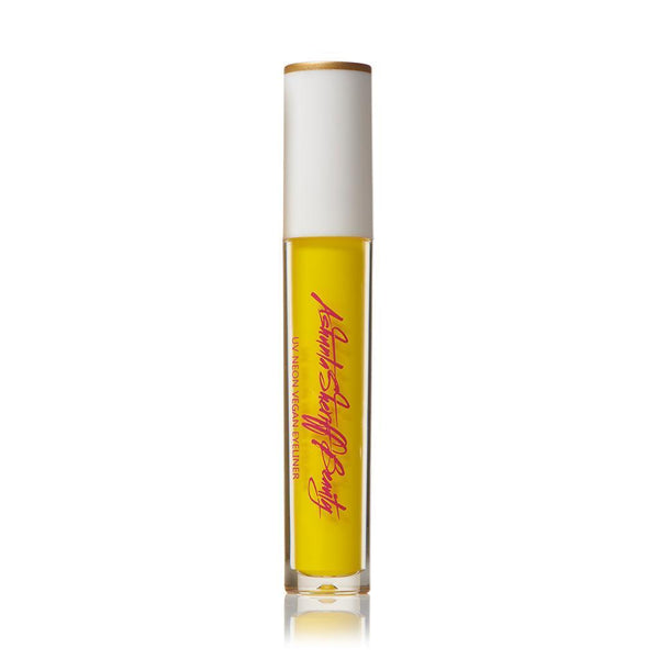 Bright yellow Ashunta Sheriff Beauty UV vegan paint liner in a clear tube with white cap and pink script logo.